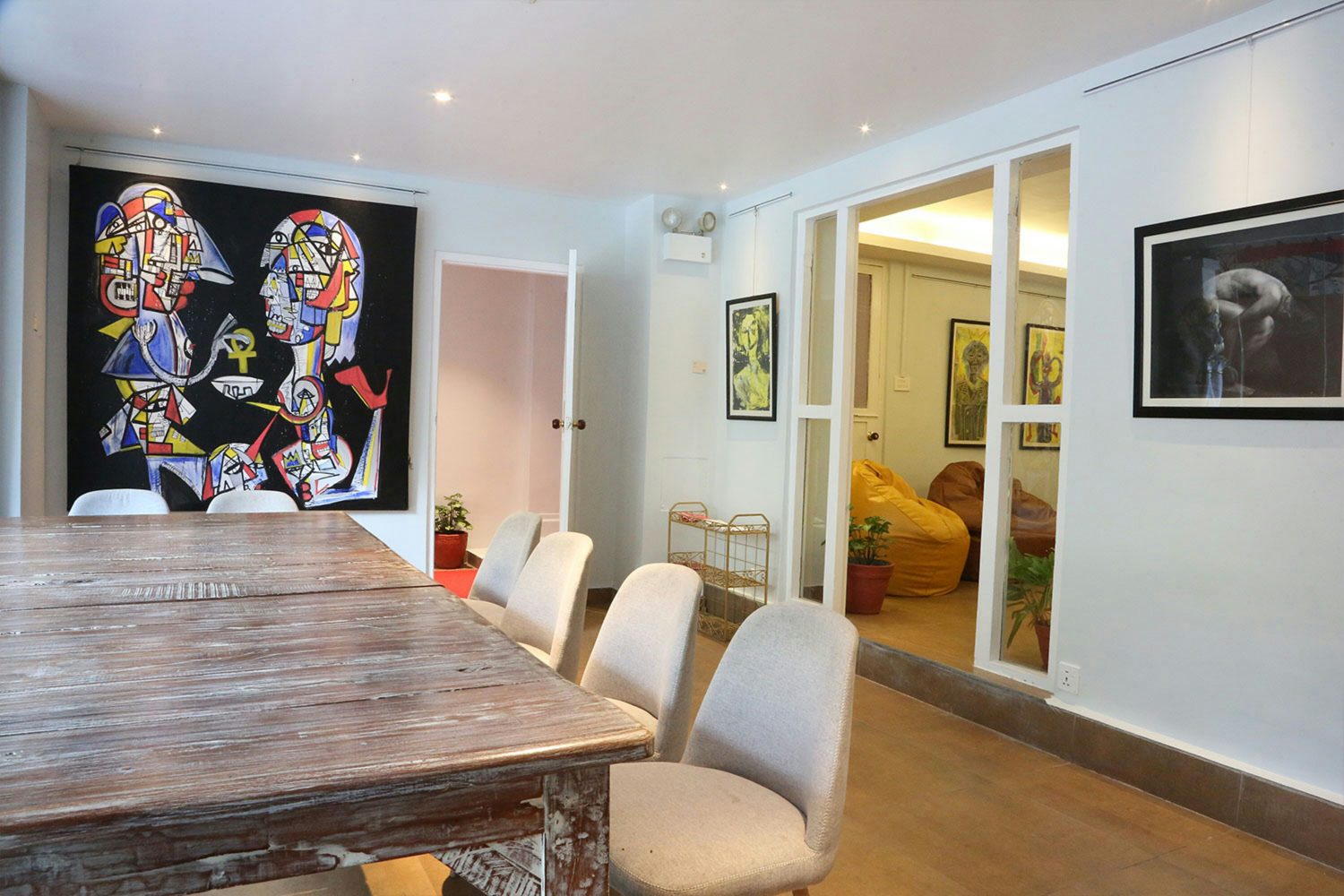 Original works installed in a furnished lounge
